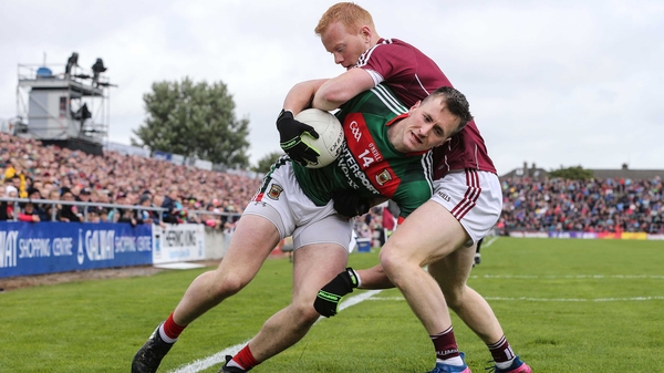 Galway's Declan Kyne tackles Cillian O'Connor of Mayo tangle in Salthill