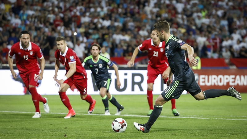 Aaron Ramsey scores from the penalty spot for Wales