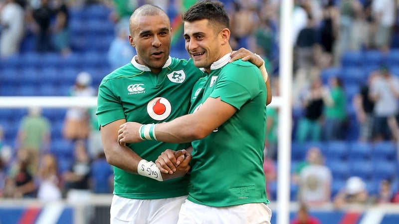 Tiernan O'Halloran (R) celebrates with Simon Zebo after Ireland beat the USA