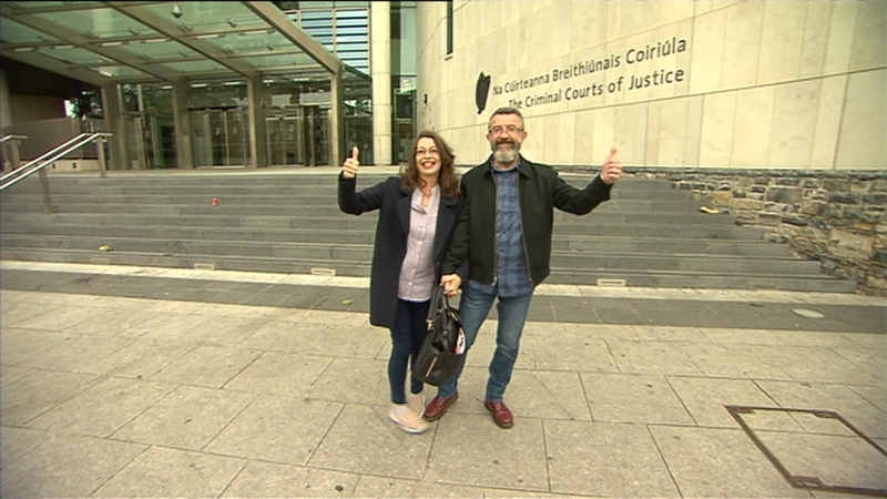 Ken Purcell leaves the court with his wife
