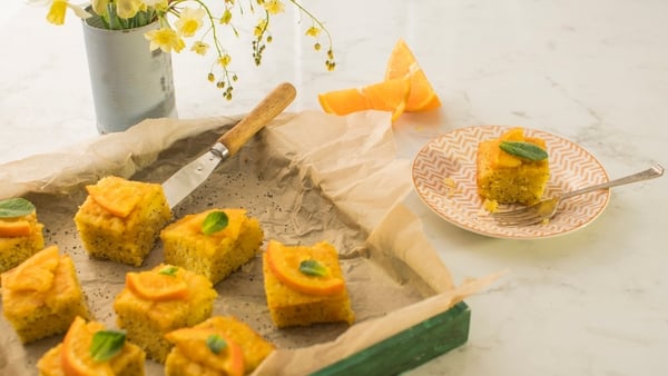 The inclusion of polenta in this fragrant and moist tray bake makes it incredibly light in texture. The fresh, zesty flavours of the oranges teamed with the sweet, sticky drizzle is a match made in heaven.