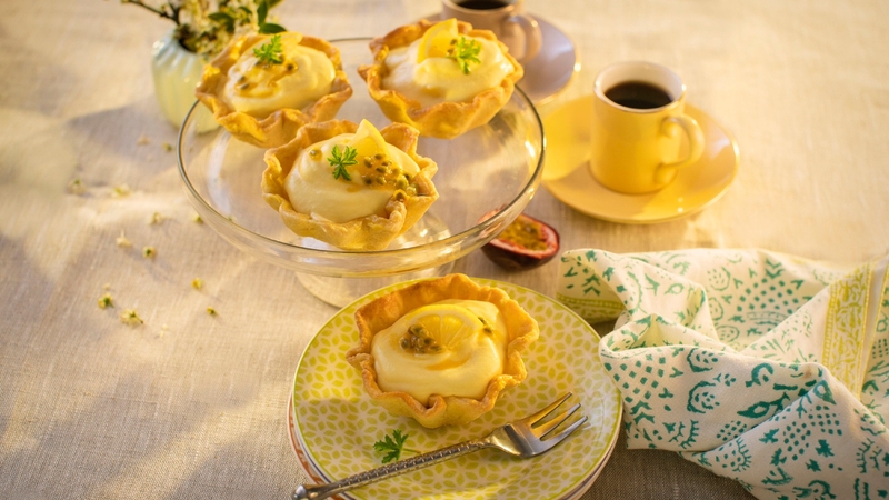 Get exotic with these mini tartlets! A creamy filling is flavoured with sweet and tangy tropical fruits and encased in a crunchy pastry base to make this perfect summer dessert. For added convenience, the pastry bases can be made ahead of time.