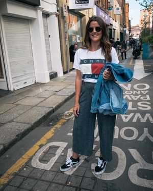 Fresh off the plane from Dubai, Alison looks stylish & fresh with her Vans, denim jacket and striped trousers.