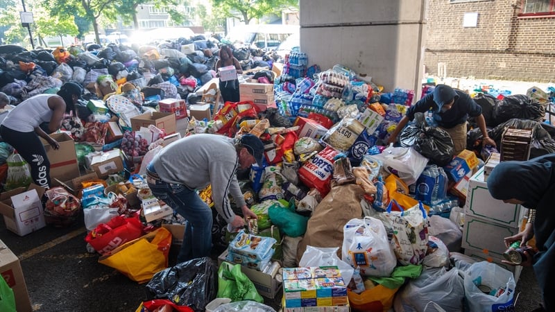 Volunteers sort through donations