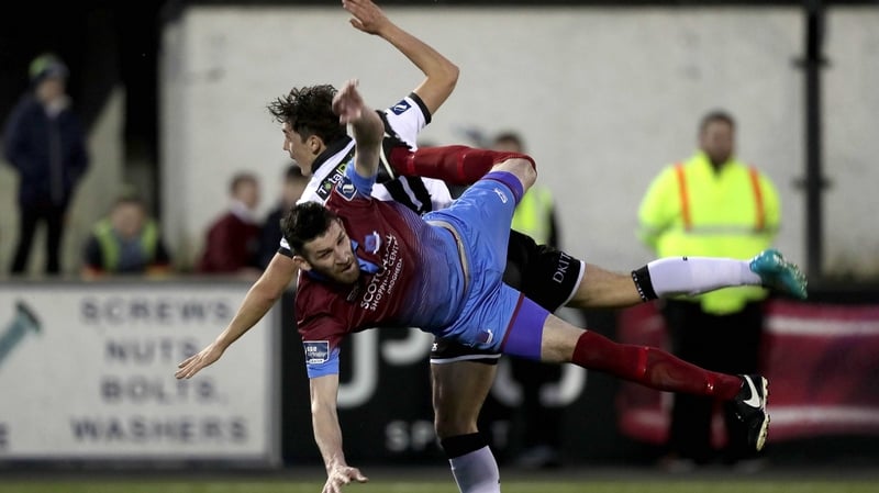 Dundalk's Jamie McGrath collides with Gavin Brennan