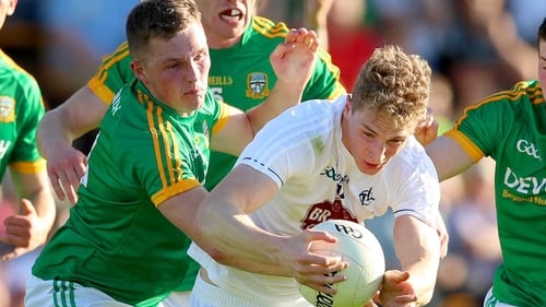 Daniel Flynn of Kildare evades a swarm of Meath bodies