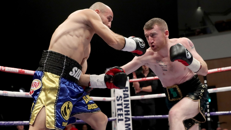 Paddy Barnes (r) in action against Silvio Olteanu