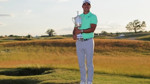 Brooks Koepka with the USA Open trophy