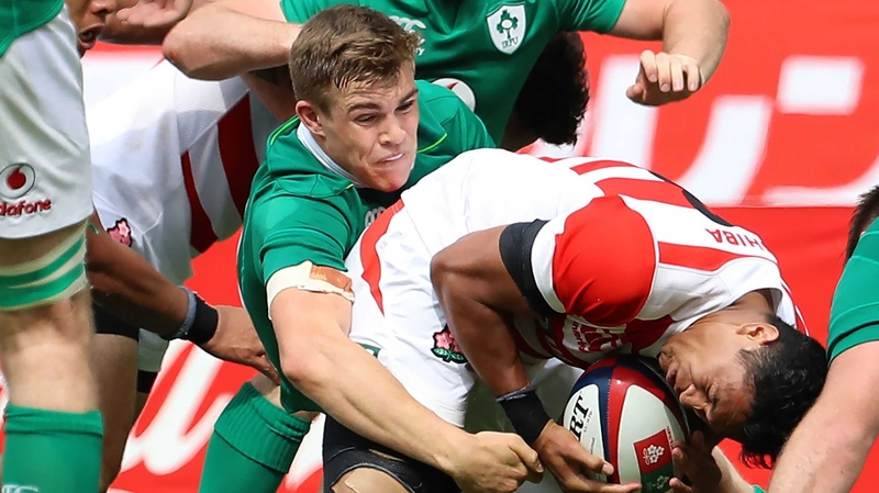 William Tupou is tackled by Ireland's Garry Ringrose