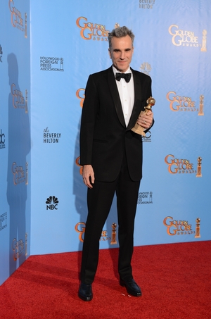 The handsome actor with his new haircut and bow tie at the Golden Globes in 2013 winning the award for Best Performance in 'Lincoln'.