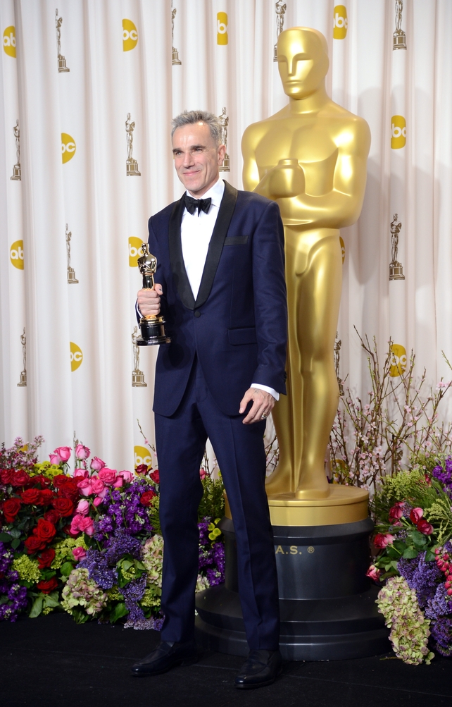 And another one! Day-Lewis in a navy blue tux winning his third Best Actor Oscar for 'Lincoln' in 2013.