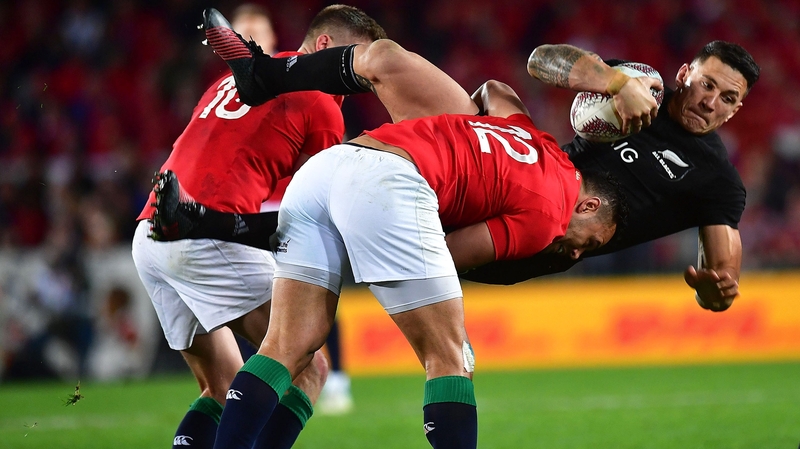 Lions' Owen Farrell and Ben Te'o tackle Sonny Bill Williams of the All Blacks