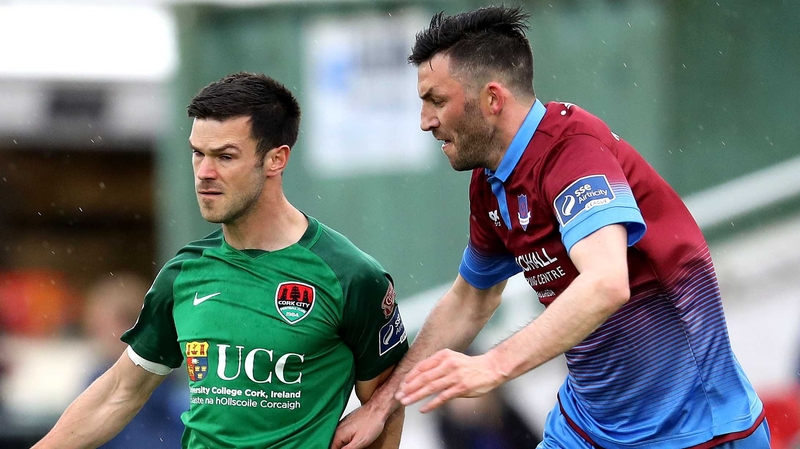 Killian Brennan (R) in a action against Cork City's Jimmy Keohane