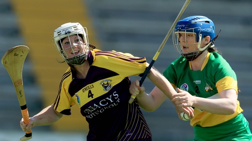 Karen Atkinson and Rachel Brennan battle for possession