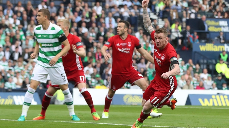 Jonny Hayes (R) in action for Aberdeen against Celtic last season