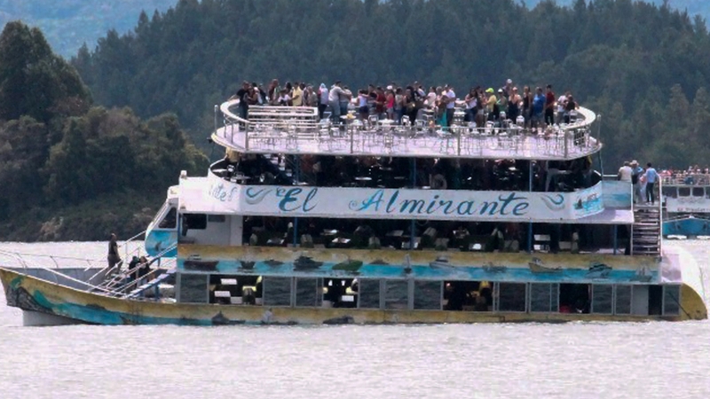 Passengers seen on board the tourist boat as it began sinking