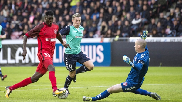 Paul Onuachu with Gerard Doherty and Aaron McEneff