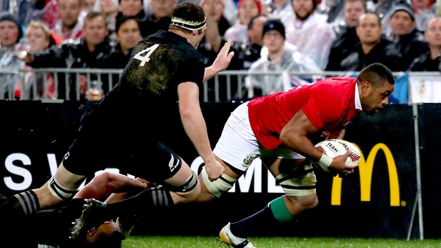 Taulupe Faletau goes over for the Lions' opening try