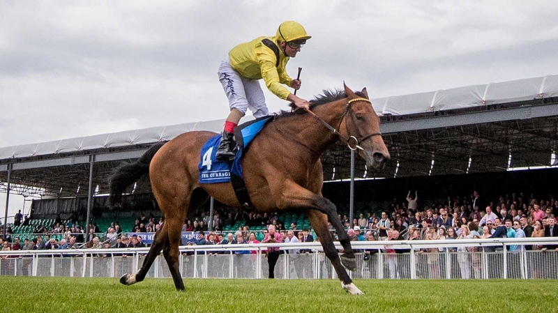 Jockey Andrea Atzeni celebrates winning The Pretty Polly Stakes on Nezwaah