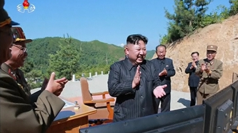 Kim Jong-un celebrates what North Korea claimed was a successful ICBM launch