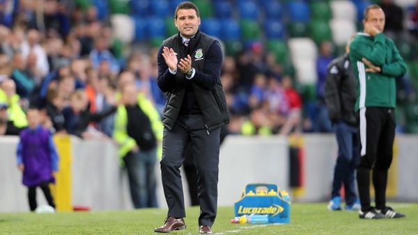 Linfield boss David Healy will get the chance to pit his wits against Celtic manager Brendan Rodgers