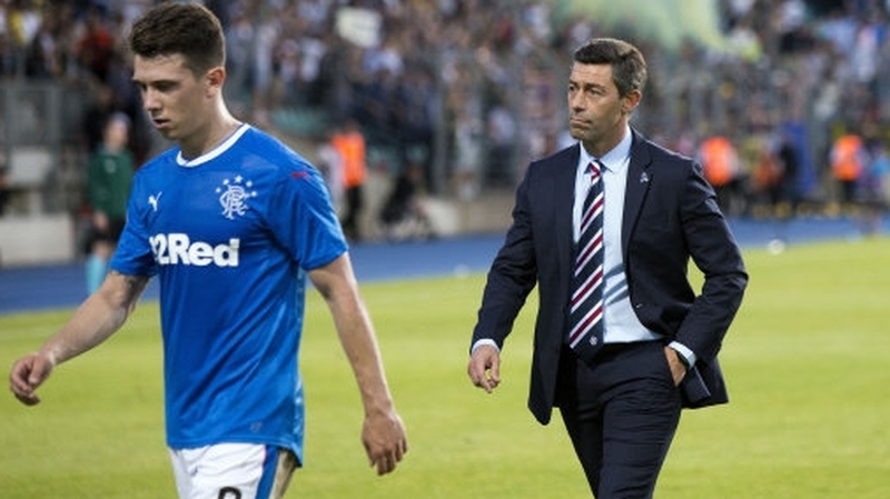 Rangers manager Pedro Caixinha (R) and Ryan Jack after they were knocked out of the Europa League
