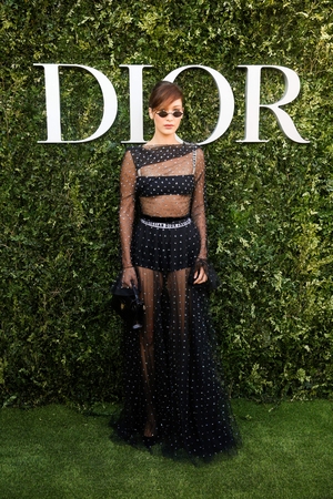 Following in Jennifer's footsteps, model Bella Hadid also wore Dior boxer shorts under her sheer polka dot dress.