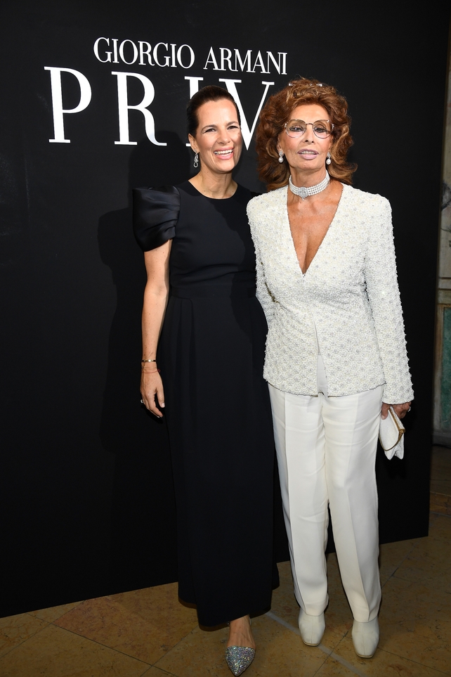 July 4: Icon Sofia Loren shone in white alongside Giorgio Armani's niece, Roberta, at the Armani Fashion Show.