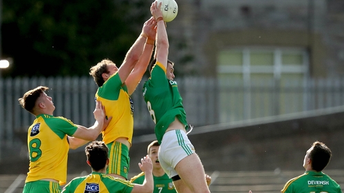 Meath's Bryan Menton and Michael Murphy of Donegal