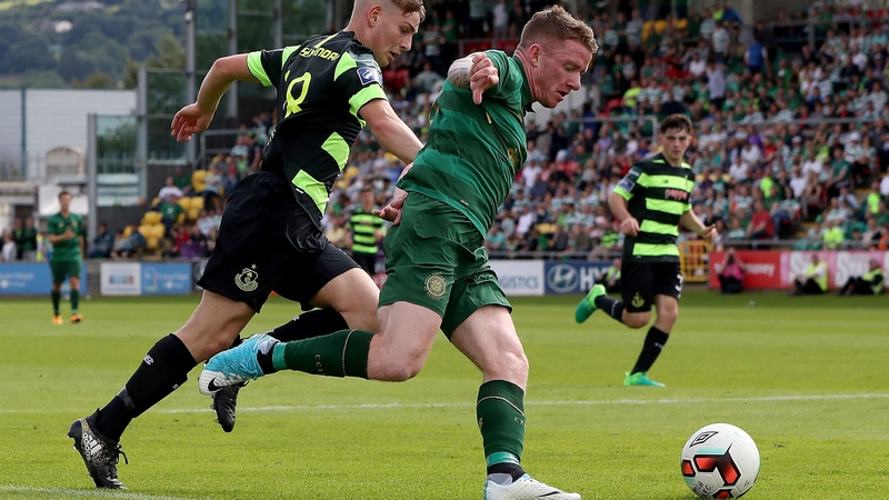 Hayes in action against Shamrock Rovers