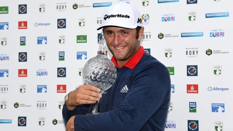 Jon Rahm wraps his arms around the Irish Open trophy
