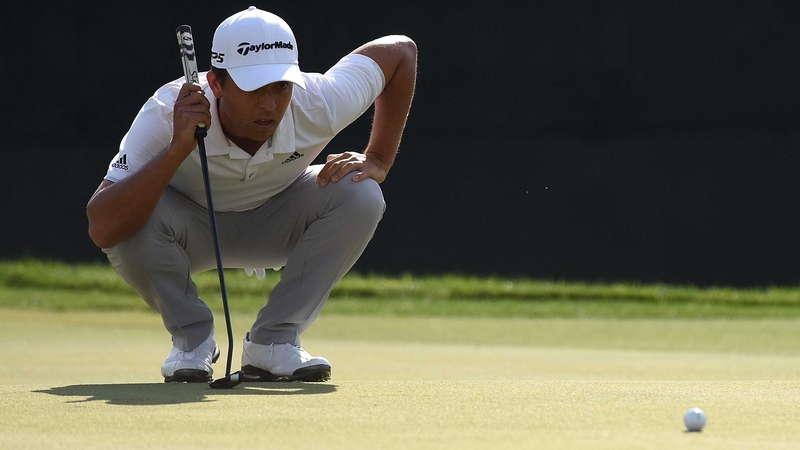 Xander Schauffele lines up his birdie putt on the 18th at the Old White TPC