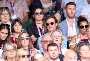 Charli XCX sat behind Sam Rollinson and Dougie Poynter. Charli and Dougie accesorised with some statement sunglasses.