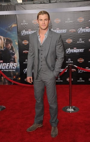 Hairbun and a grey suit are the winning combo for Chris Hemsworth at the 'The Avengers' premiere in 2012.