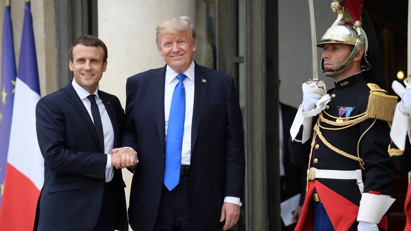 Emmanuel Macron shared a lengthy handshake with Donald Trump