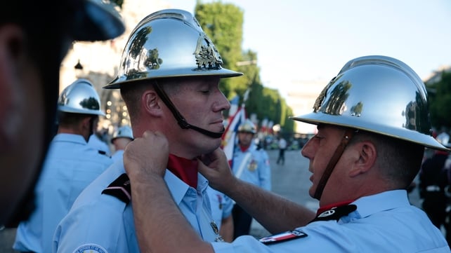 French firefighters prepare for the parade