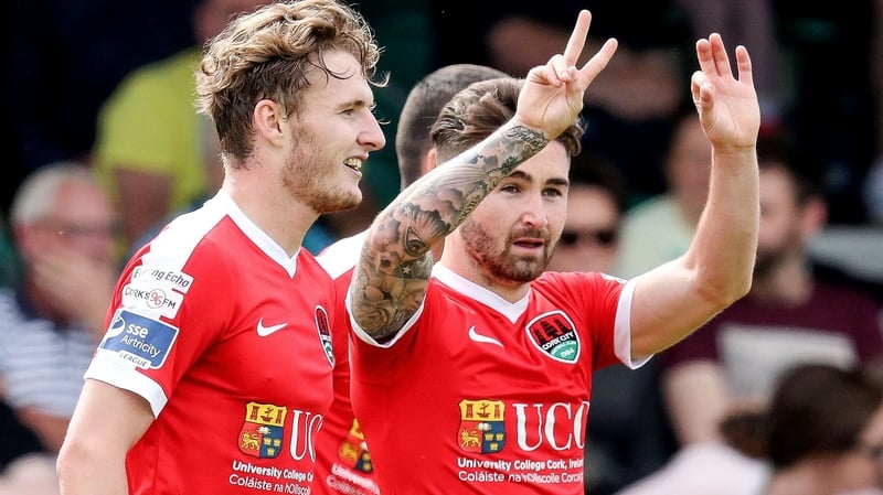Cork's Sean Maguire celebrates scoring a goal with his team-mates
