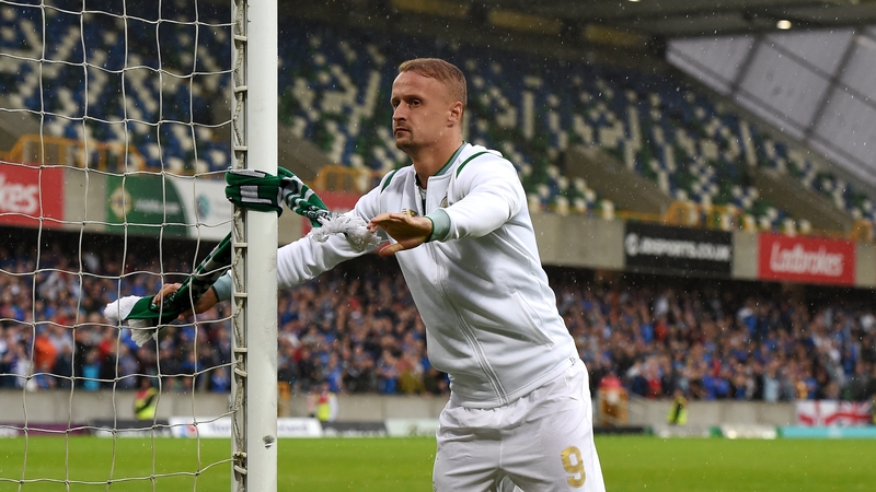 Leigh Griffiths tying a Celtic scarf to a Windsor Park goalpost after Friday's 2-0 win over Linfield