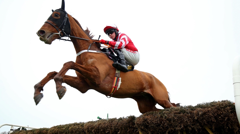Jonathan Burke jumping on Acapella Bourgeois