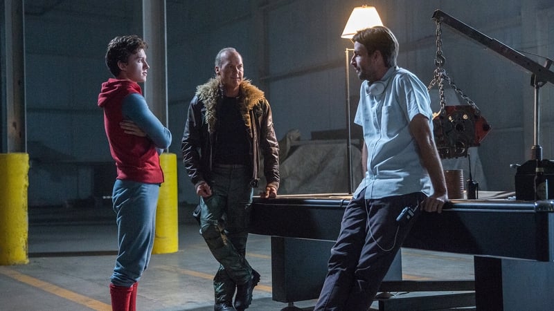 Jon Watts (right) on the Spider-Man: Homecoming set with stars Tom Holland and Michael Keaton