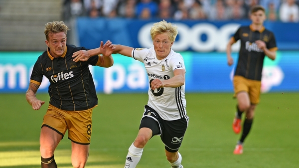 Dundalk's John Mountney and Birger Meling of Rosenborg