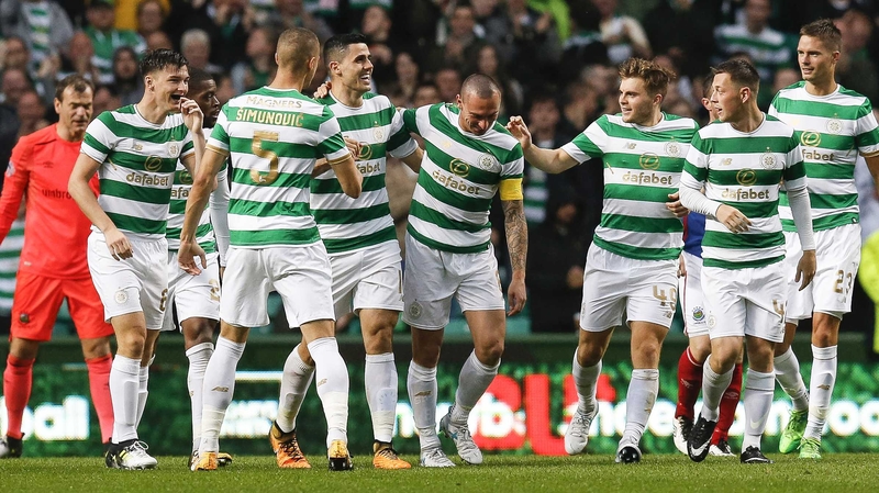 Celtic's Tom Rogic celebrates the second goal with Scott Brown