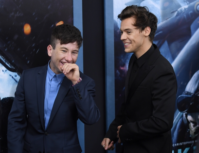 Love/Hate actor Barry Keoghan walks the red carpet with English singer Harry Styles who is wearing Harry is wearing Calvin Klein.