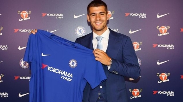 Alvaro Morata poses with his Chelsea shirt