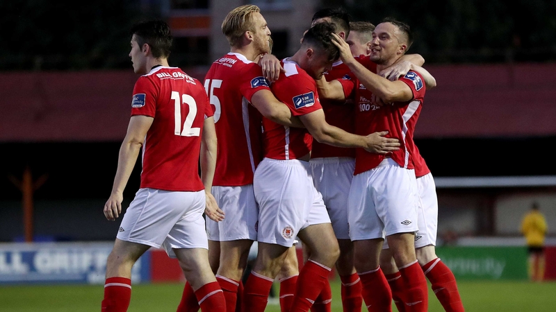 St Pat's players celebrate Josh O'Hanlon late goal at Richmond Park