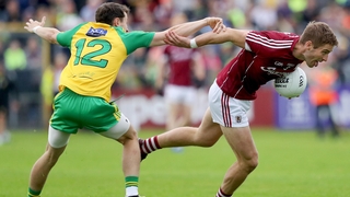 Galway's Gary O'Donnell with Eoin McHugh of Donegal