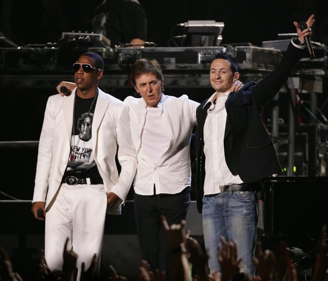 Jay-Z, Paul McCartney and Chester Bennington perform during the 48th Annual Grammy Awards in 2006