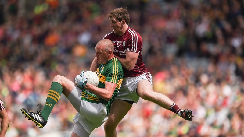 Kerry's Kieran Donaghy with David Walsh of Galway
