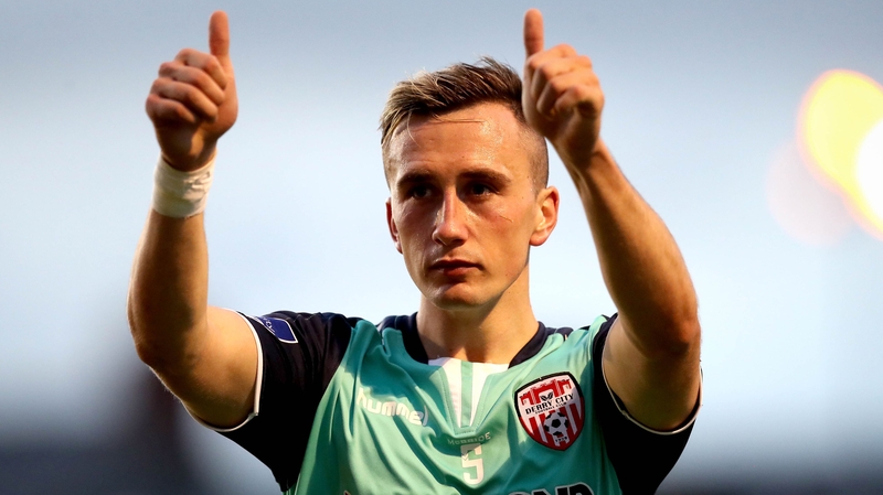 Aaron McEneff salutes the Derry fans