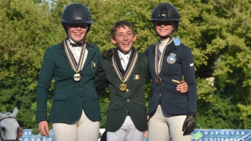 (Left to right): Kate Derwin, Harry Allen and Cora Hirn (SWE) share the podium in Hungary